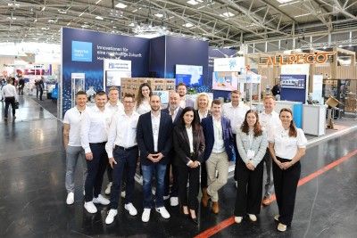 Team des bayme vbm Gemeinschaftsstands mit allen Mitausstellern